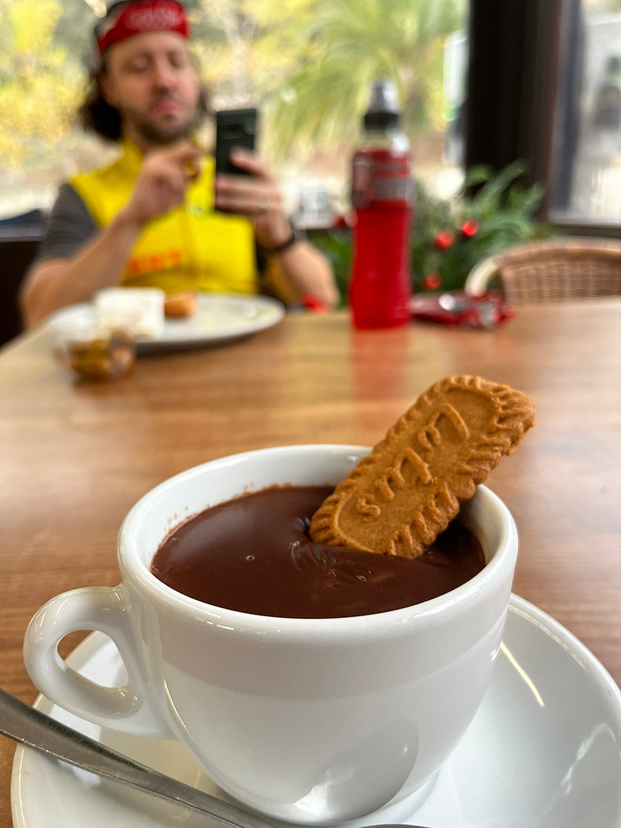 Riccardo having a thick hot chocolate at the cafe
