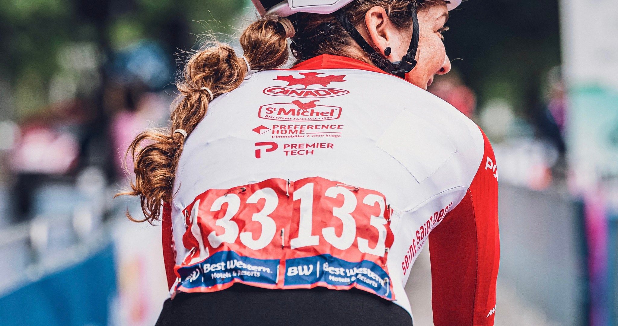A close up view of the combative award winners special red race numbers.