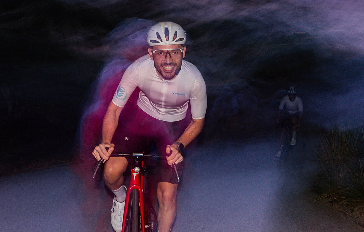 Cyclist riding against the elements