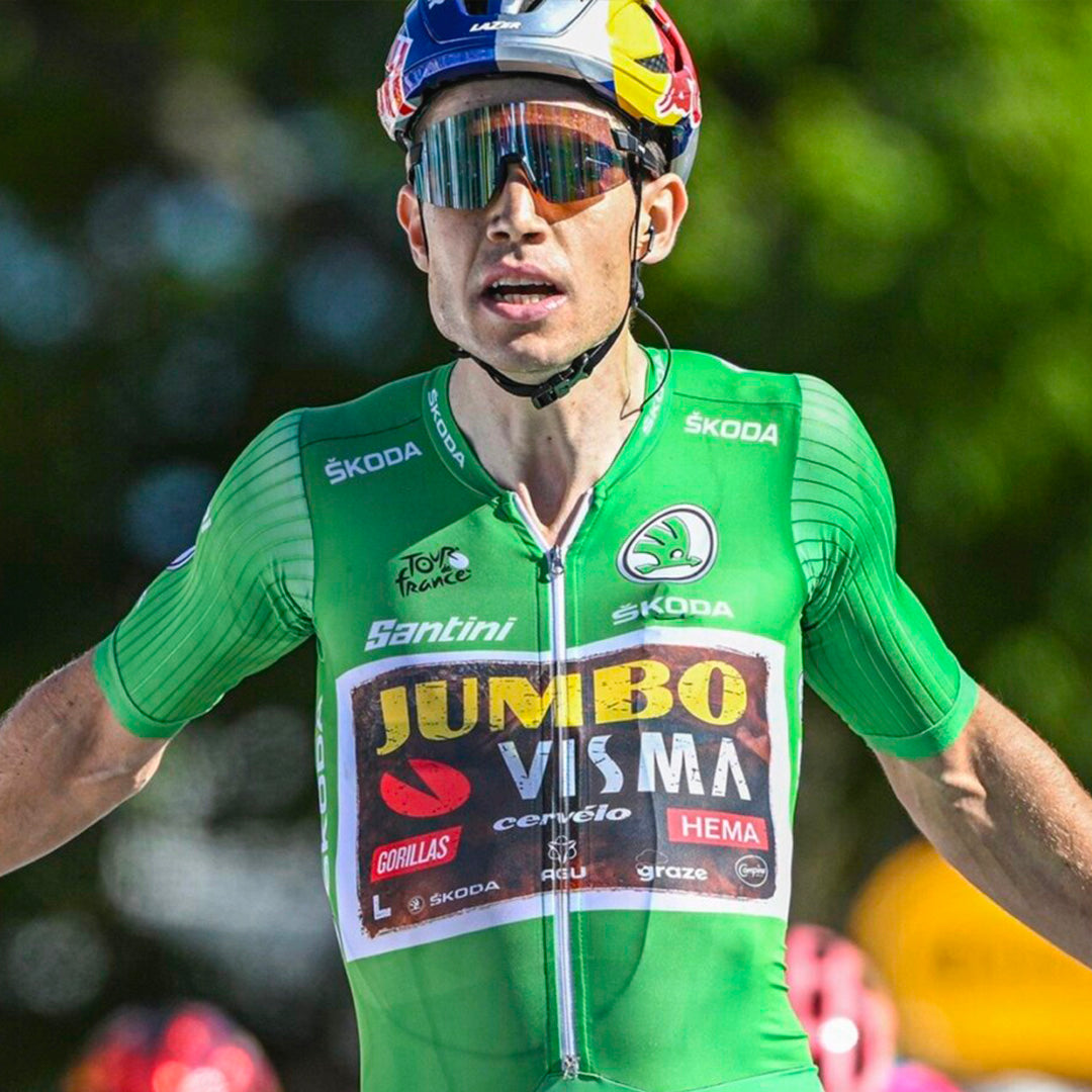 Wout van Aert winning a sprint stage of the Tour de France in the green jersey.