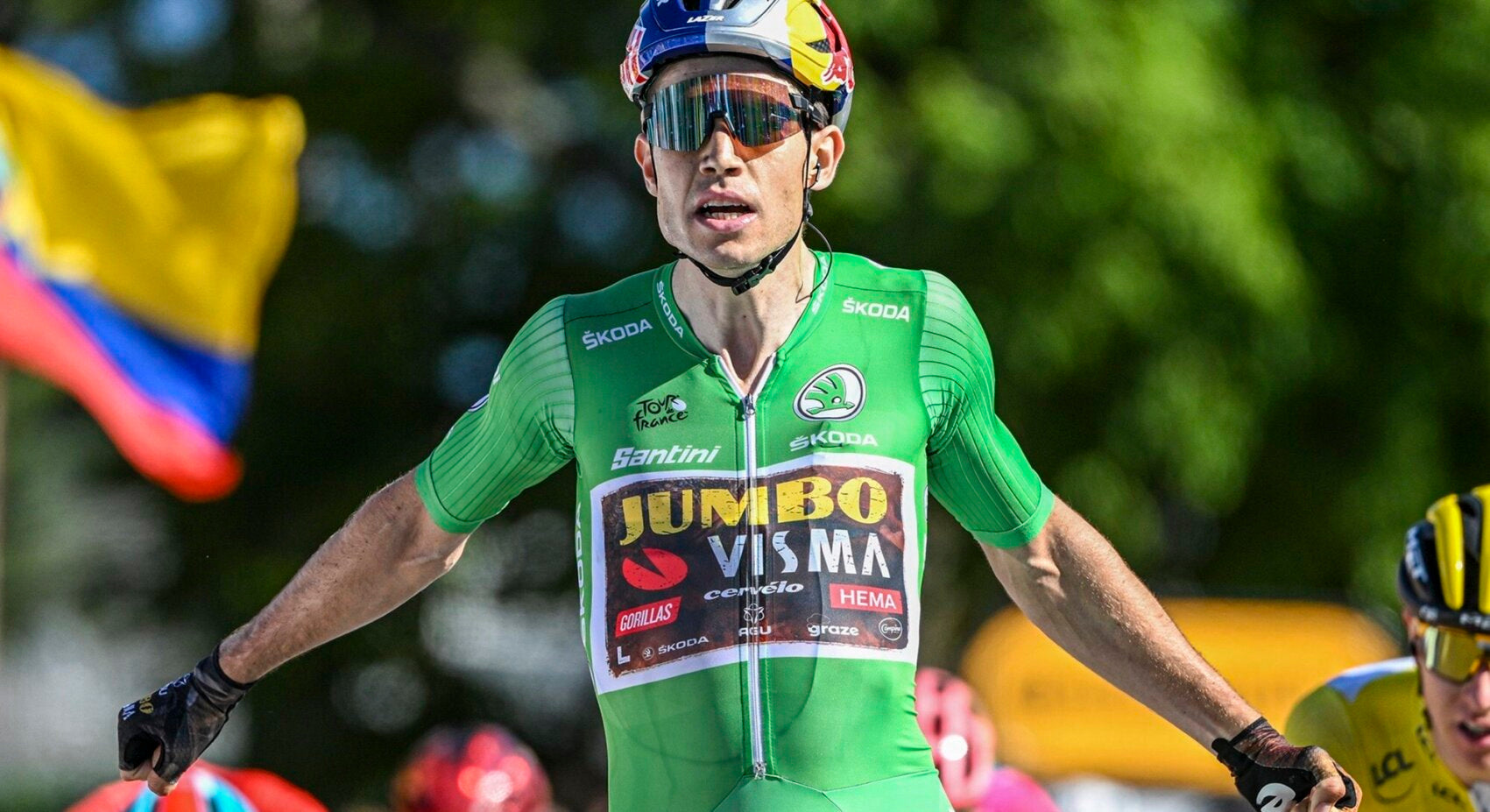 Wout van Aert winning a bunch sprint at the Tour de France