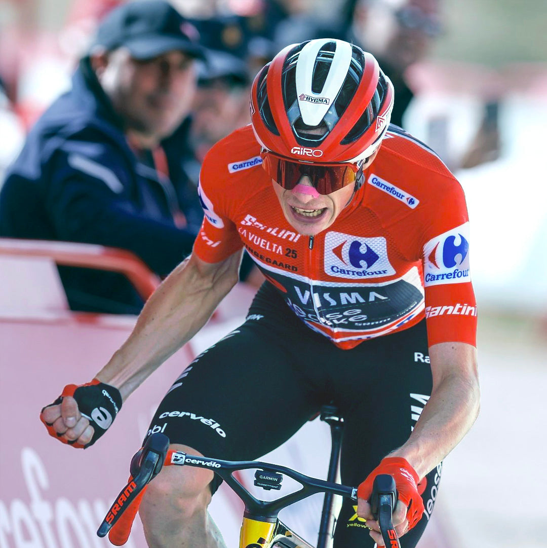 Jonas Vingegaard winning s stage of La Vuelta in the red jersey.